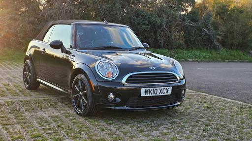 2009 COOPER CONVERTIBLE PRICE 2,499 YEAR 2009 MILEAGE 98,000 ENGINE 1.6 PETROL COLOUR BLACK... photo
